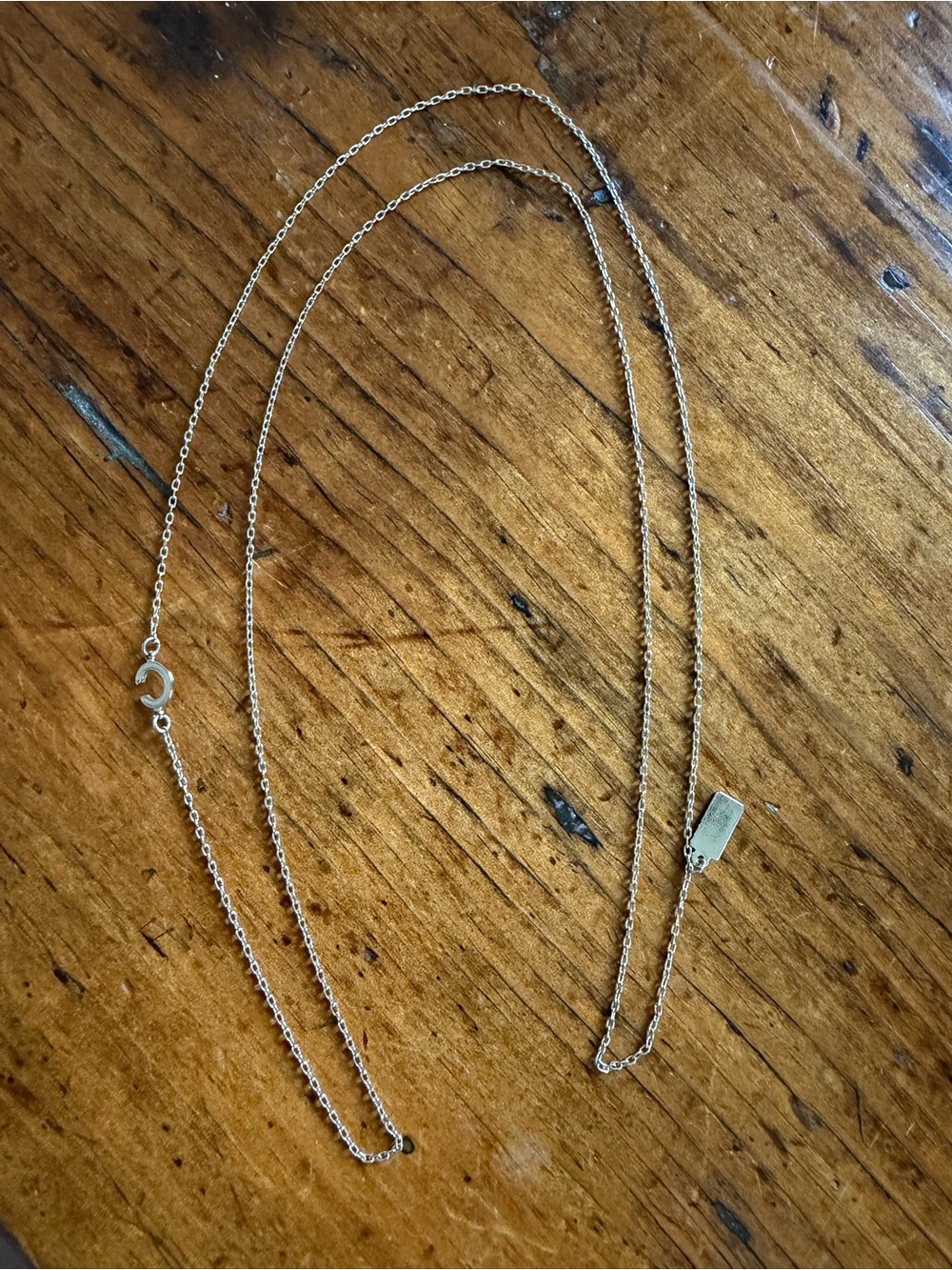 Kate Spade “C” initial long gold necklace